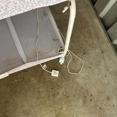 Delta Children Smart Sleep Auto Glide Pink & White Bassinet with Bluetooth