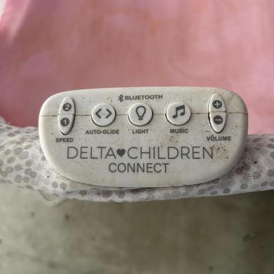 Delta Children Smart Sleep Auto Glide Pink & White Bassinet with Bluetooth