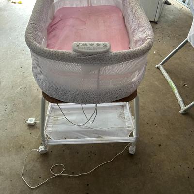 Delta Children Smart Sleep Auto Glide Pink & White Bassinet with Bluetooth