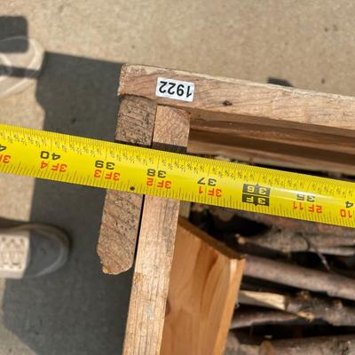 Scrap wood container on heavy wheels