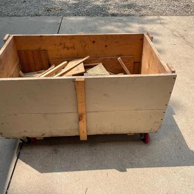 Scrap wood container on heavy wheels