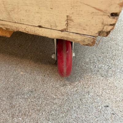 Scrap wood container on heavy wheels