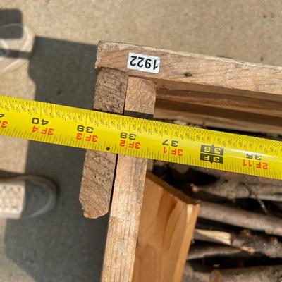 Scrap wood container on heavy wheels