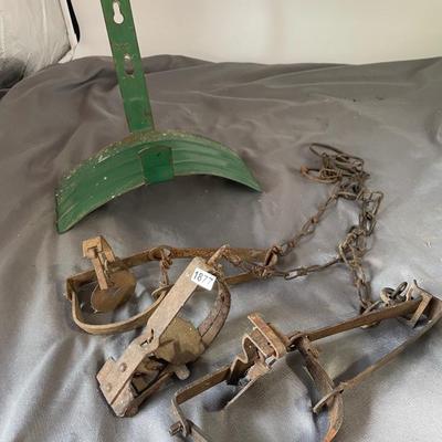 Traps and hose holder