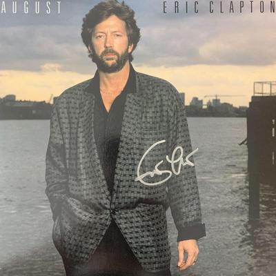 Eric Clapton August signed album. GFA Authenticated