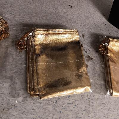 FREE STANDING JEWELRY DISPLAYS AND GOLD DRAWSTRING BAGS