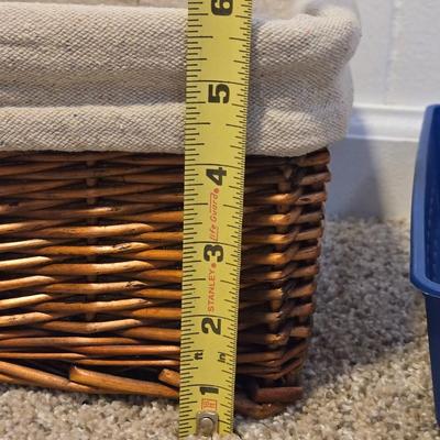 A Wicker Basket with Liner and Plastic Basket