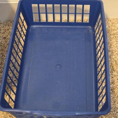 A Wicker Basket with Liner and Plastic Basket