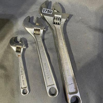Adjustable wrenches