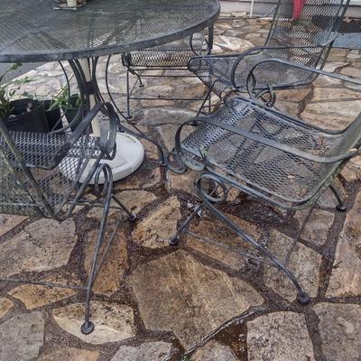 Wrought Metal Five Piece Patio Set with Spring Rocker Style Chairs includes Umbrella