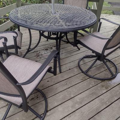 Wrought Metal Five Piece Patio Set with Swivel Style Chairs includes Umbrella