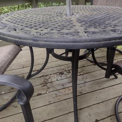 Wrought Metal Five Piece Patio Set with Swivel Style Chairs includes Umbrella