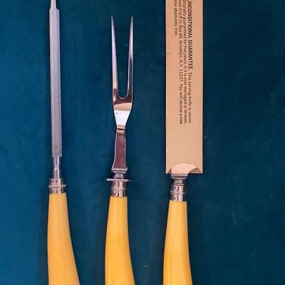 Vintage butterscotch bakelight carving set