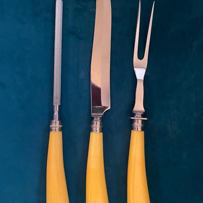 Vintage butterscotch bakelight carving set