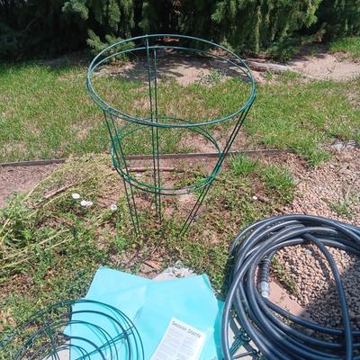 GARDEN HOSE, TOMATO CAGES AND STARTERS