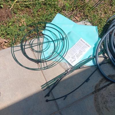 GARDEN HOSE, TOMATO CAGES AND STARTERS