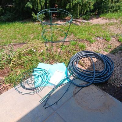 GARDEN HOSE, TOMATO CAGES AND STARTERS