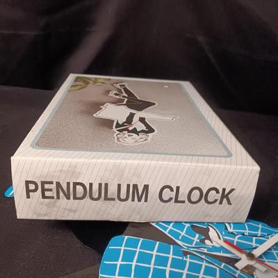 ELVIS PRESLEY PENDULUM WALL CLOCK