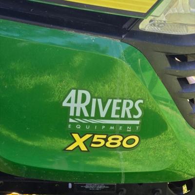 JOHN DEERE 4 Rivers X 580 with 54" Accel Deep Deck with John Deere Tiller, John Deere Snow Blower, and Yardworks Lawn Sweeper