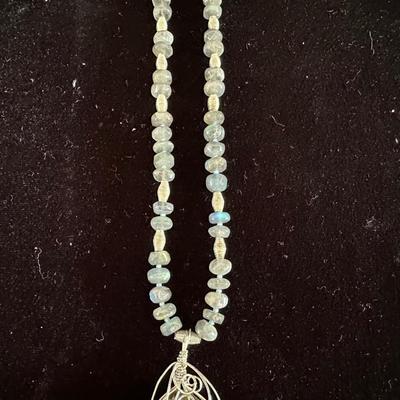 STONE PENDANT ON A BEADED CHAIN