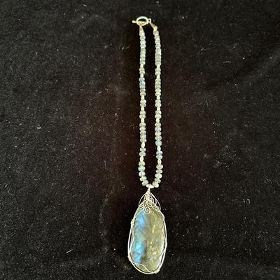STONE PENDANT ON A BEADED CHAIN