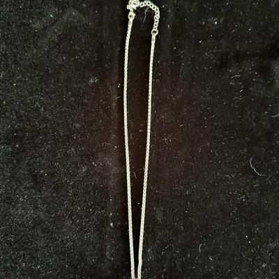 BEADED CROSS ON A CHAIN