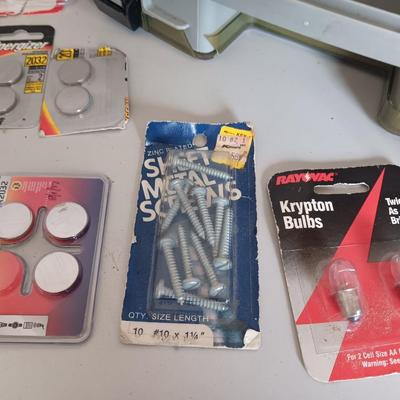 Variety of household hardware in divided organizing case