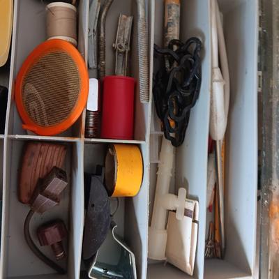 Variety of household hardware in divided organizing case