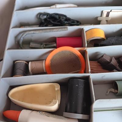 Variety of household hardware in divided organizing case
