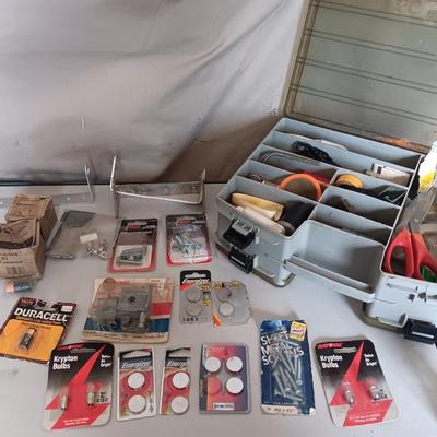 Variety of household hardware in divided organizing case