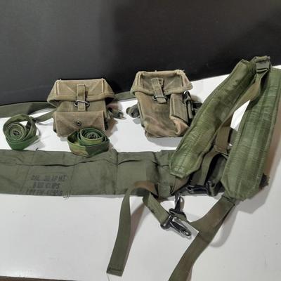 Military issued canvass ammo bags with belts and shoulder straps