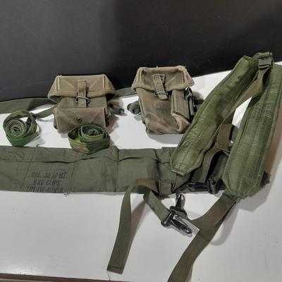 Military issued canvass ammo bags with belts and shoulder straps