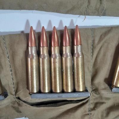 Assortment of Ammunition in bandoleers = 5 round clips
