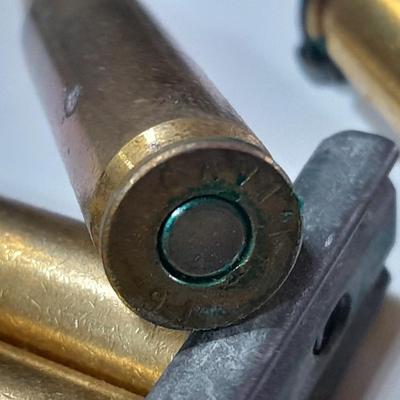 Assortment of Ammunition in bandoleers = 5 round clips