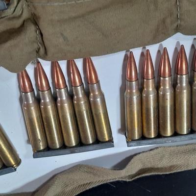 Assortment of Ammunition in bandoleers = 5 round clips