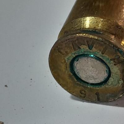 Assortment of Ammunition in bandoleers = 5 round clips