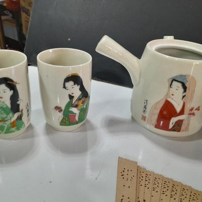 Asian style Tea set with mugs - checkbook cover - and wooden fan