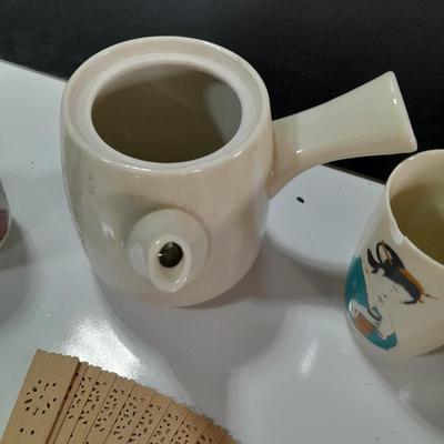 Asian style Tea set with mugs - checkbook cover - and wooden fan
