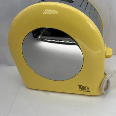 TML working 1998 yellow Japanese Toaster