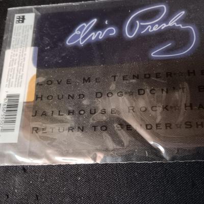 ELVIS MAGNETS, CATALOG OF RECORDS AND TAPES, STICKERS AND MORE