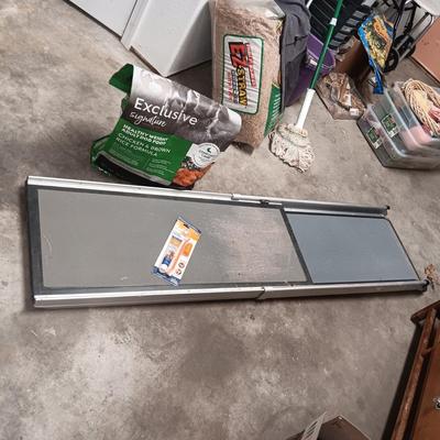 EXTENDABLE PET RAMP, PARTIAL BAG OF DOG FOOD AND ORAL HYGIENE KIT