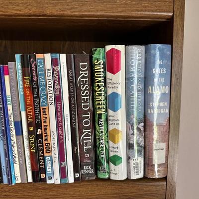AN ASSORTMENT OF BOOKS (4)