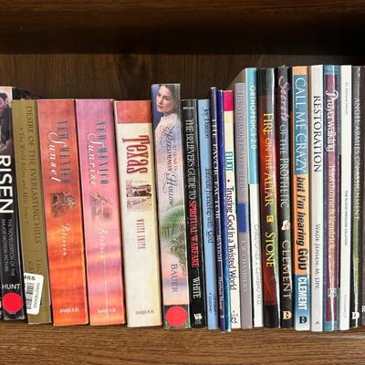 AN ASSORTMENT OF BOOKS (4)