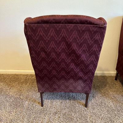 2 BURGUNDY WING BACK CHAIRS AND 1 OTTOMAN