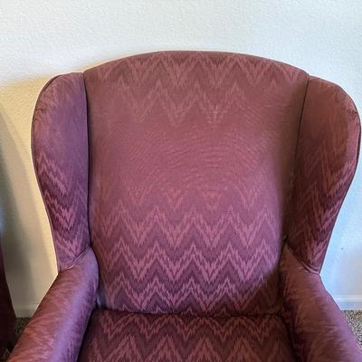 2 BURGUNDY WING BACK CHAIRS AND 1 OTTOMAN