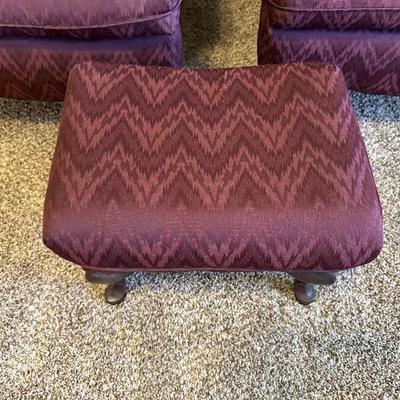 2 BURGUNDY WING BACK CHAIRS AND 1 OTTOMAN