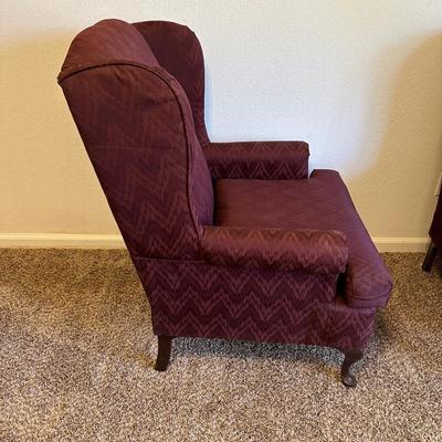 2 BURGUNDY WING BACK CHAIRS AND 1 OTTOMAN