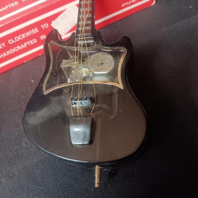 MUSICAL ELVIS GUITAR AND AN ILLUMINATING MUSICAL ORNAMENT