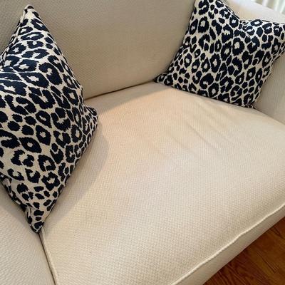 Gorgeous custom upholstered sofa and comfy oversized chair in creamy white
