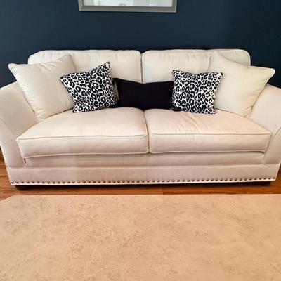 Gorgeous custom upholstered sofa and comfy oversized chair in creamy white